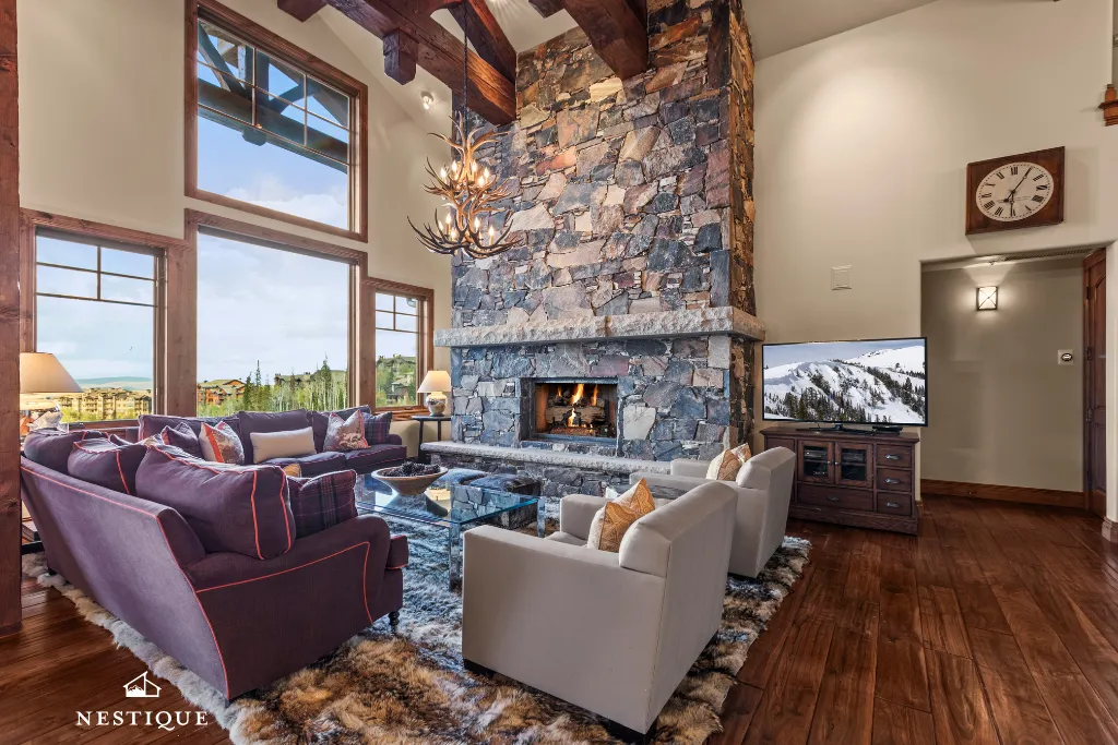 Stone fireplace and great room at Empire Summit at The Grand Lodge, Deer Valley
