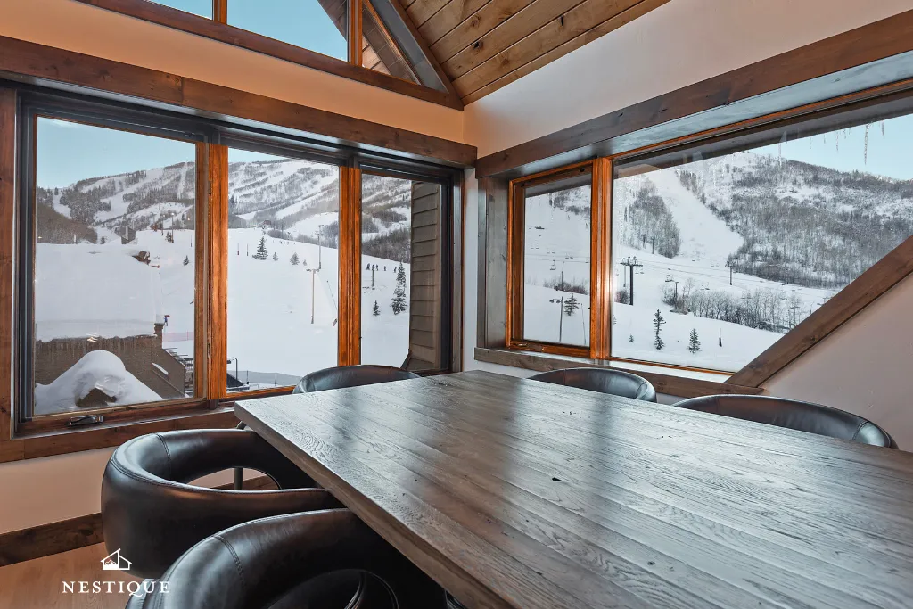 Ski slope views from the dining room at Presidential Suite at Mountain Village