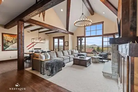 Vaulted great room with mountain views at Slopeside Sanctuary at Silver Star