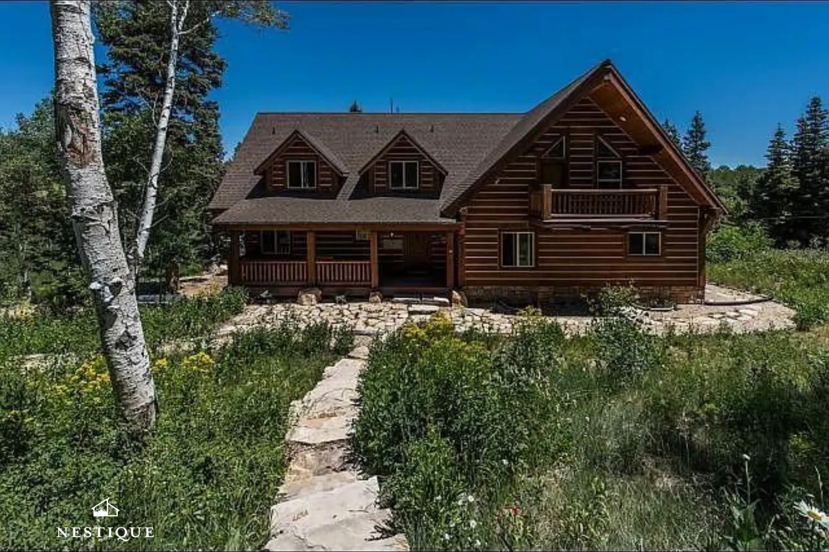 Unforgotten Utopia, a log home among aspens and wildflowers in Tollgate Canyon